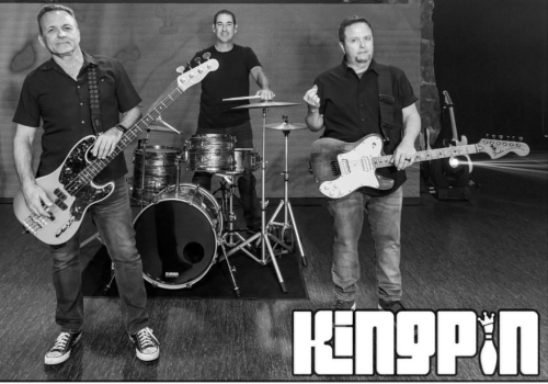 Three band members pose with their instruments in a black-and-white photo. The logo 