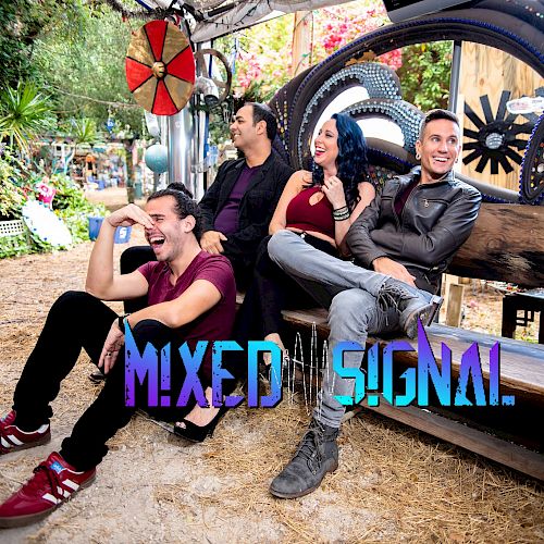 Four people are sitting on a bench outdoors, with the words "Mixed Signal" in the foreground.